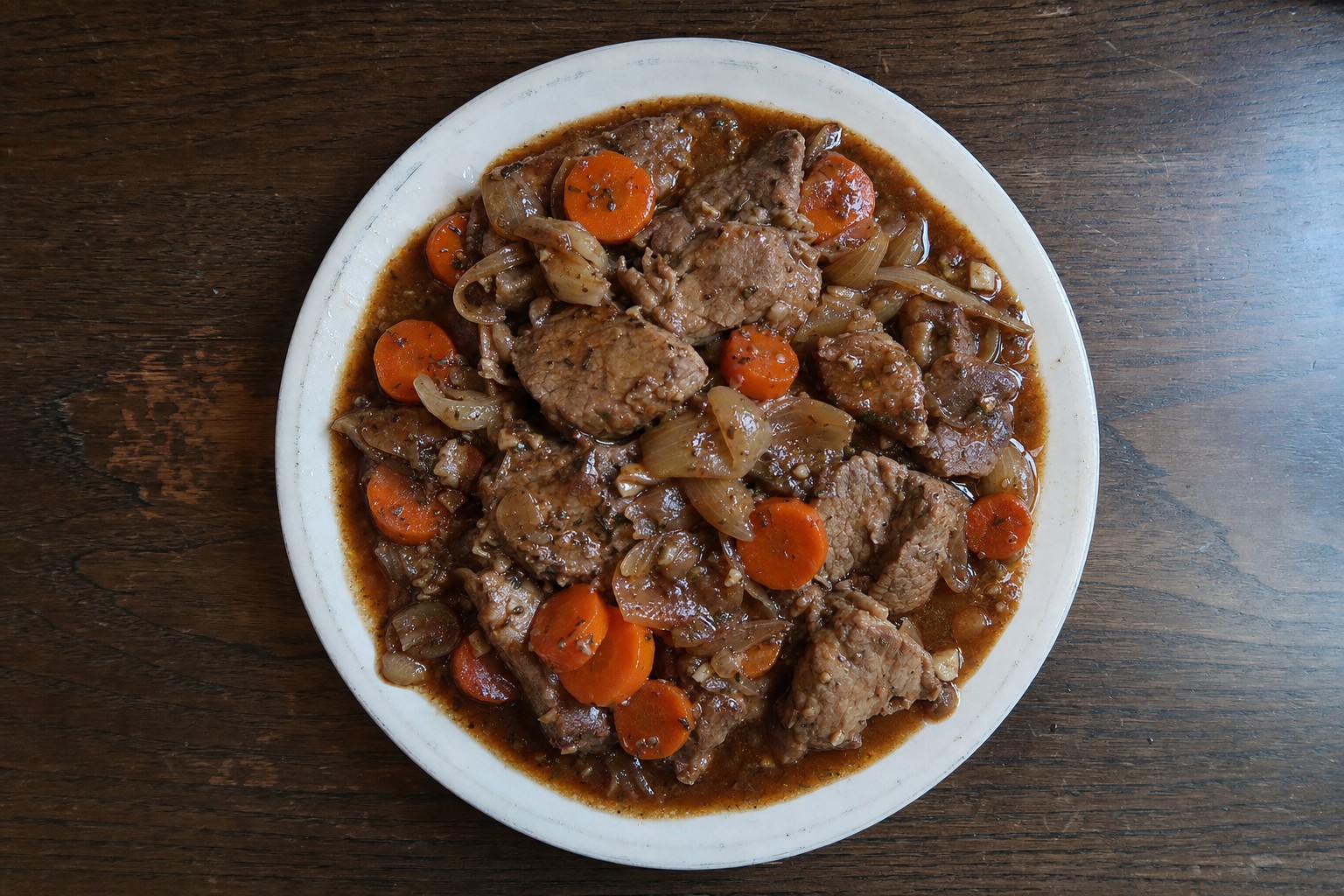 Vitela estufada com cenoura e ervas